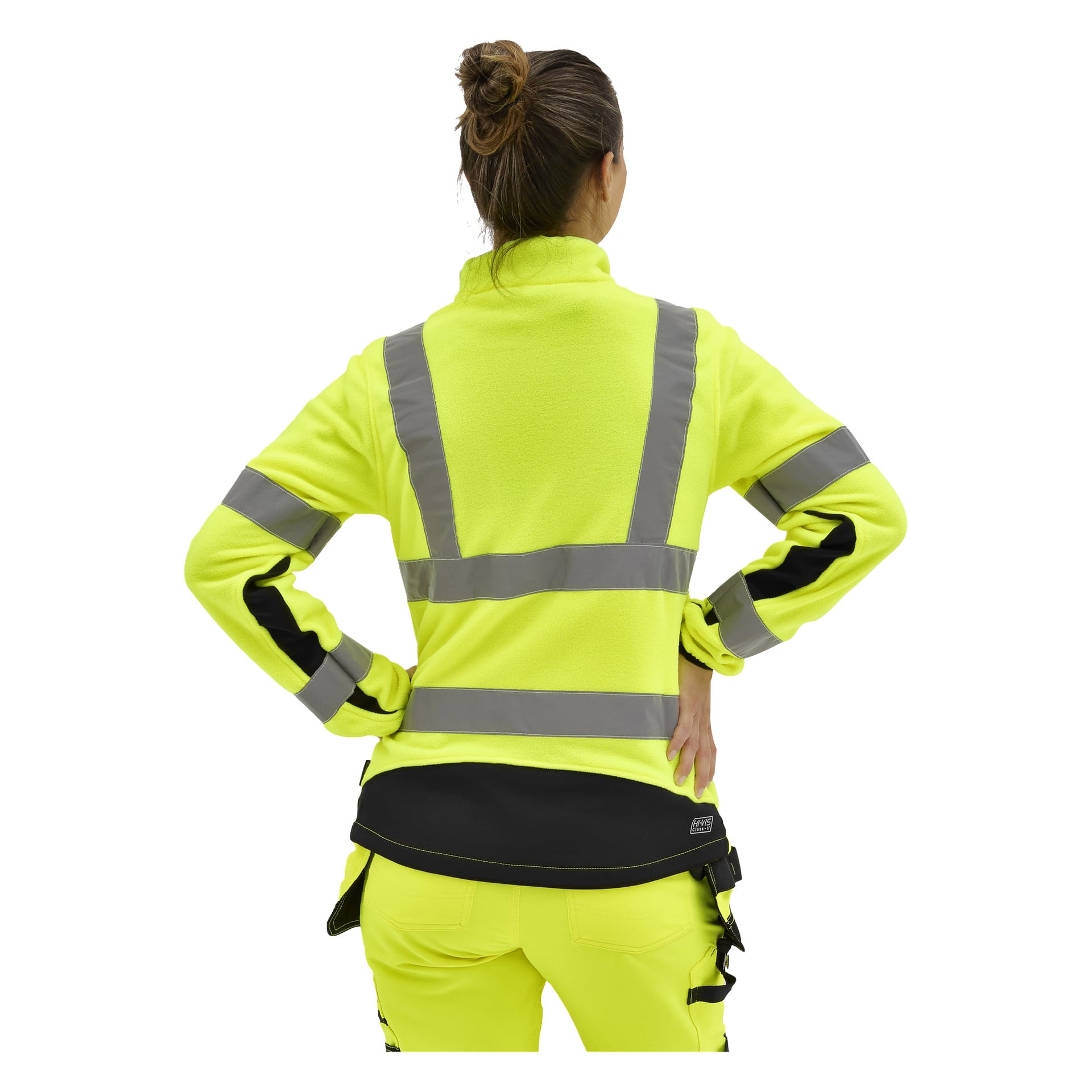 En kvinna med händerna på höfterna vänder sig bort och visar en Bluewear Ladies hög-vis-fleecejacka och byxor med grå ränder och svarta detaljer.