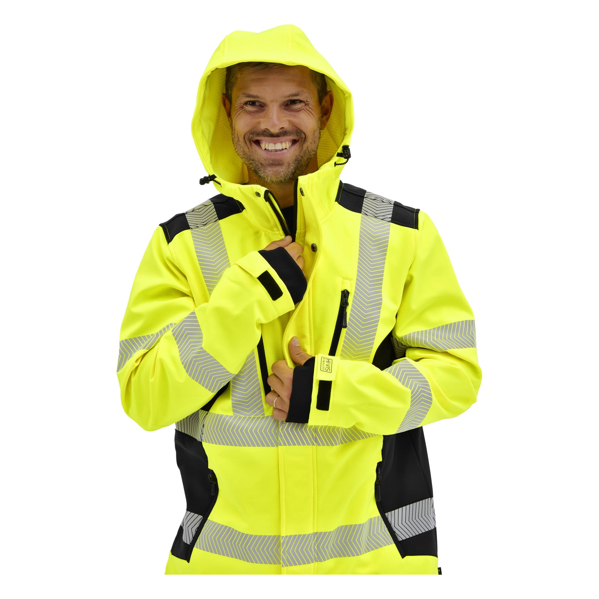 Die lächelnde Person hält den Reißverschluss einer leuchtend gelben Bluewear Hi-Vis-Jacke mit reflektierenden Streifen, schwarzen Details, Kapuze und Daumenlöchern.