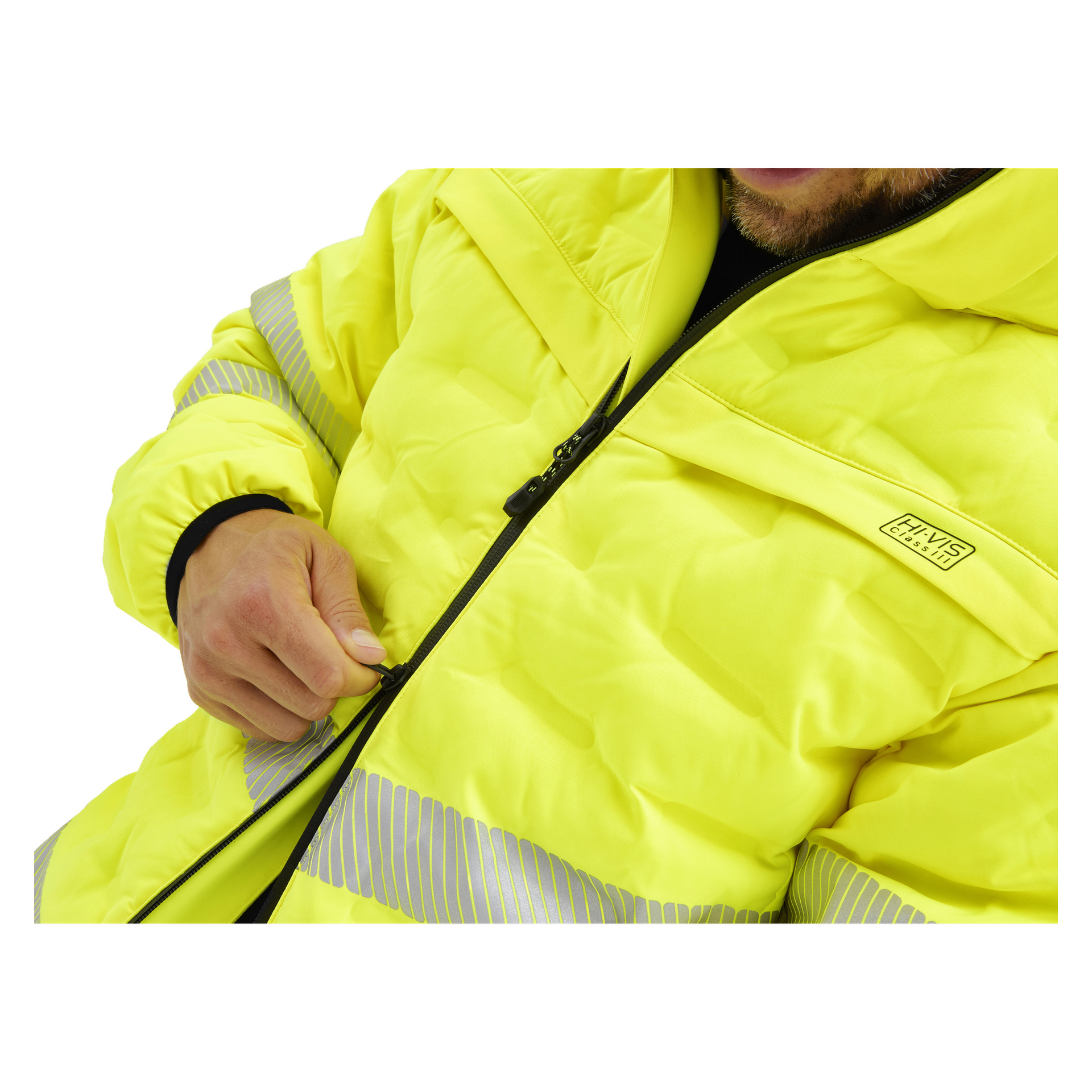 En person drar igen dragkedjan på en ljusgul Hi-Vis Bluewear-jacka med grå reflekterande band och en HIVIS-logga. Endast deras mun är synlig.