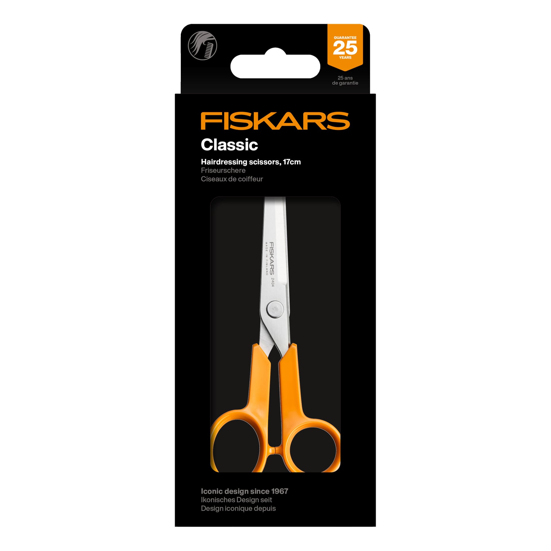 Fiskars frisörsax med orange handtag, 17 cm, i en svart låda med produktinformation och en 25-års garantietikett.