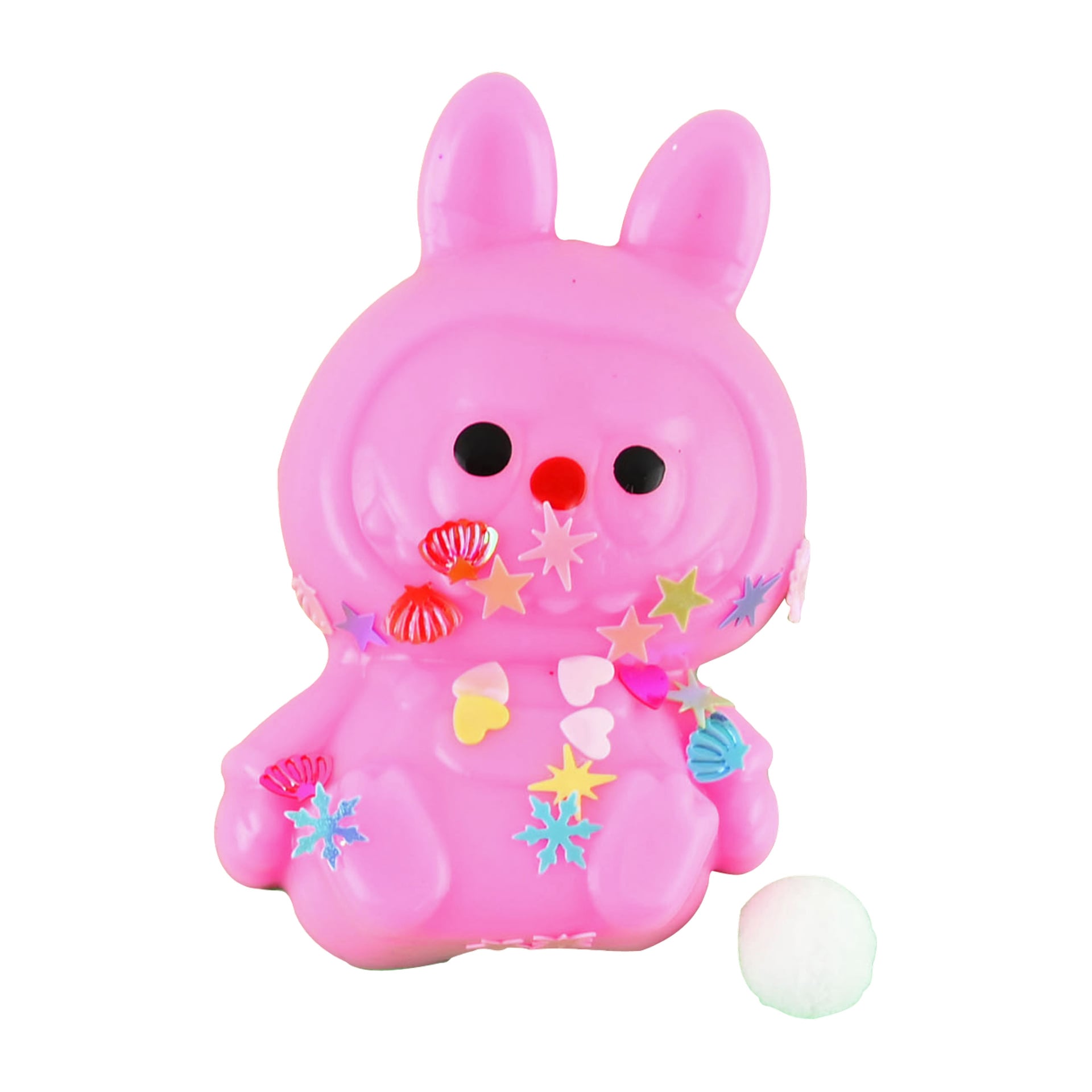En Robetoy Stress Ball formad som en rosa kanin har svarta ögon, en röd näsa och är dekorerad med stjärnor, hjärtan och snäckor på kroppen. En liten vit boll sitter längst ner till höger om kaninen.