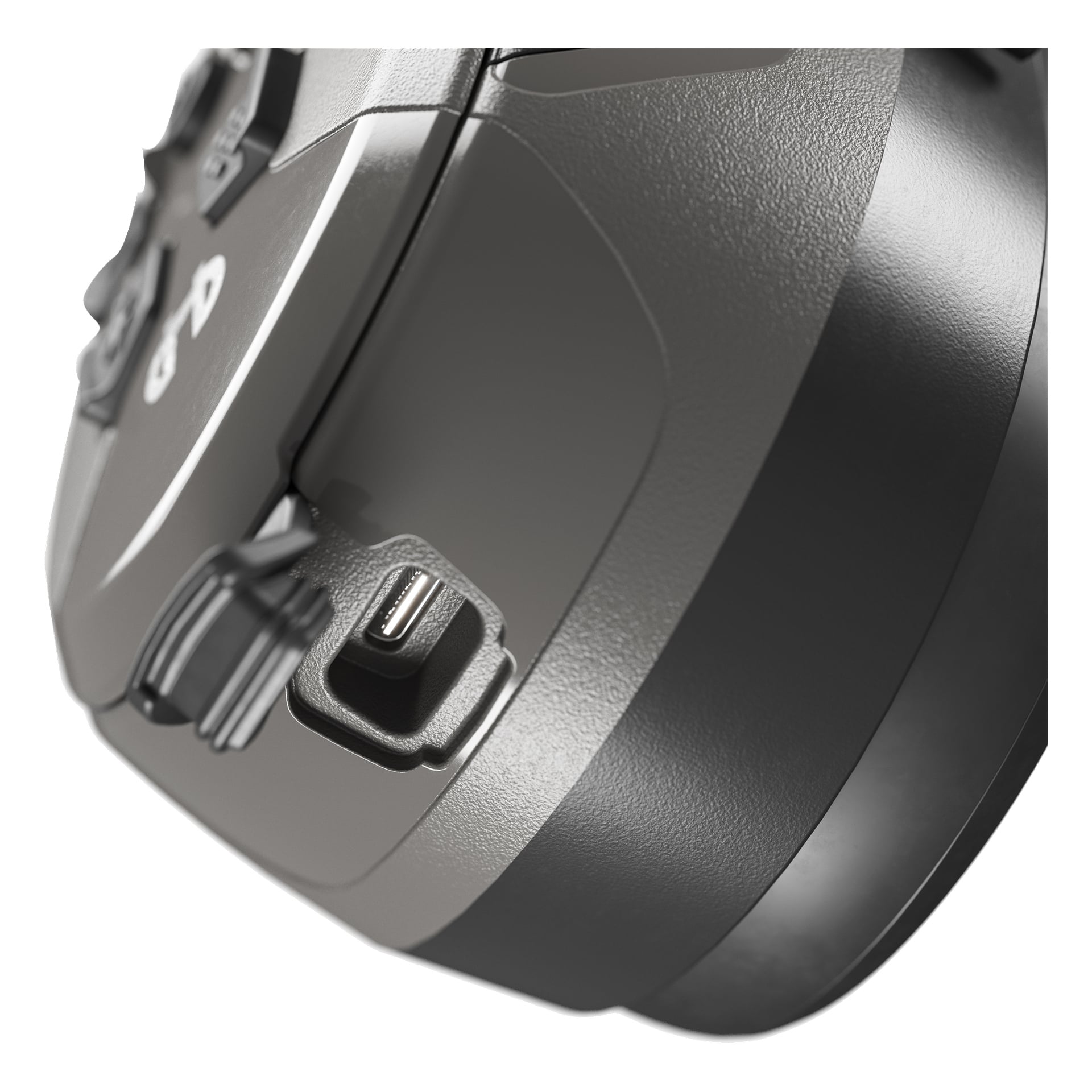Svart elektronisk enhet i närbild, med USB-C-laddningsport och framhäver dess texturerade yta.