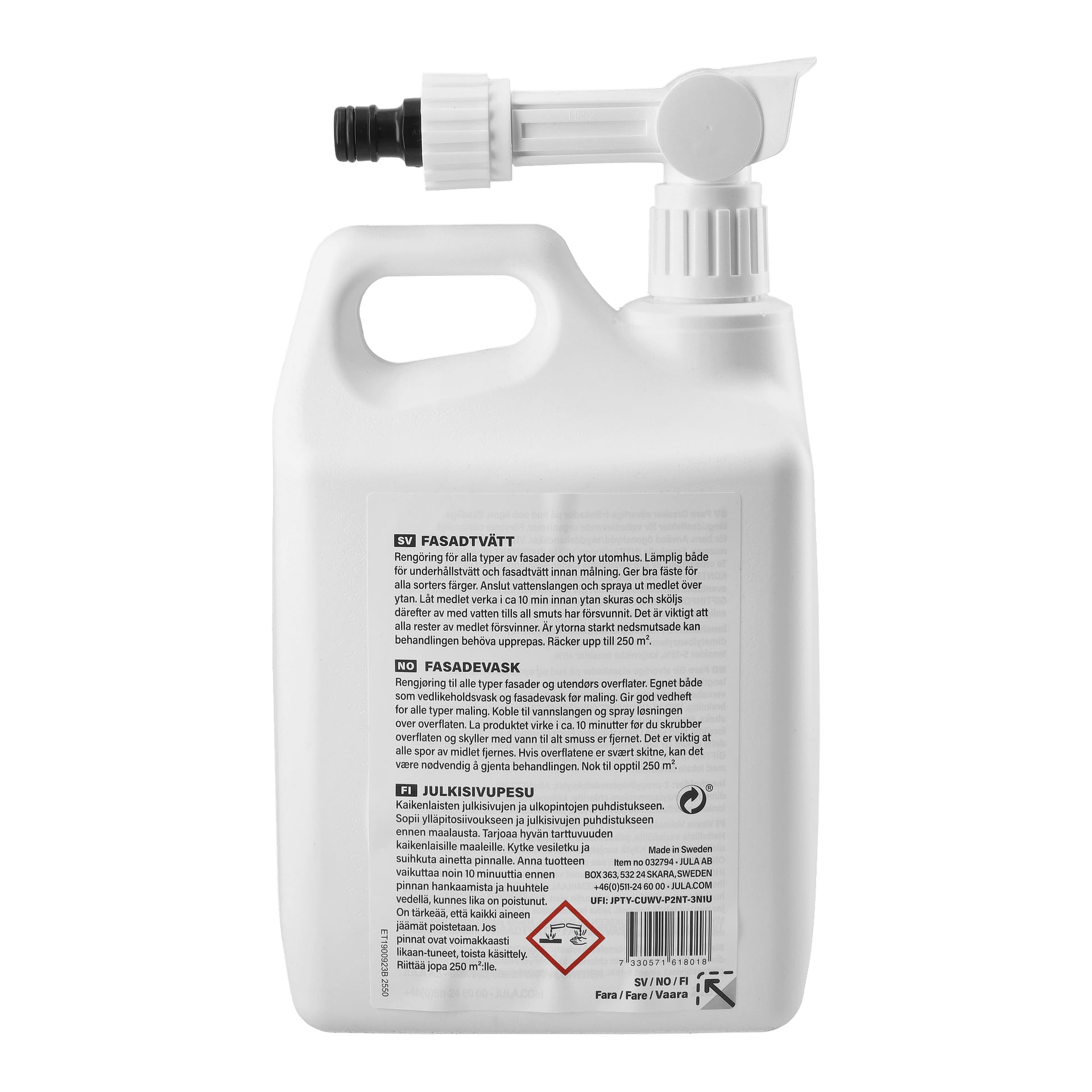 En vit plastbehållare med handtag och spraymunstycke. Baksidan av etiketten visar instruktioner, produktinformation och en varningssymbol nere till höger.