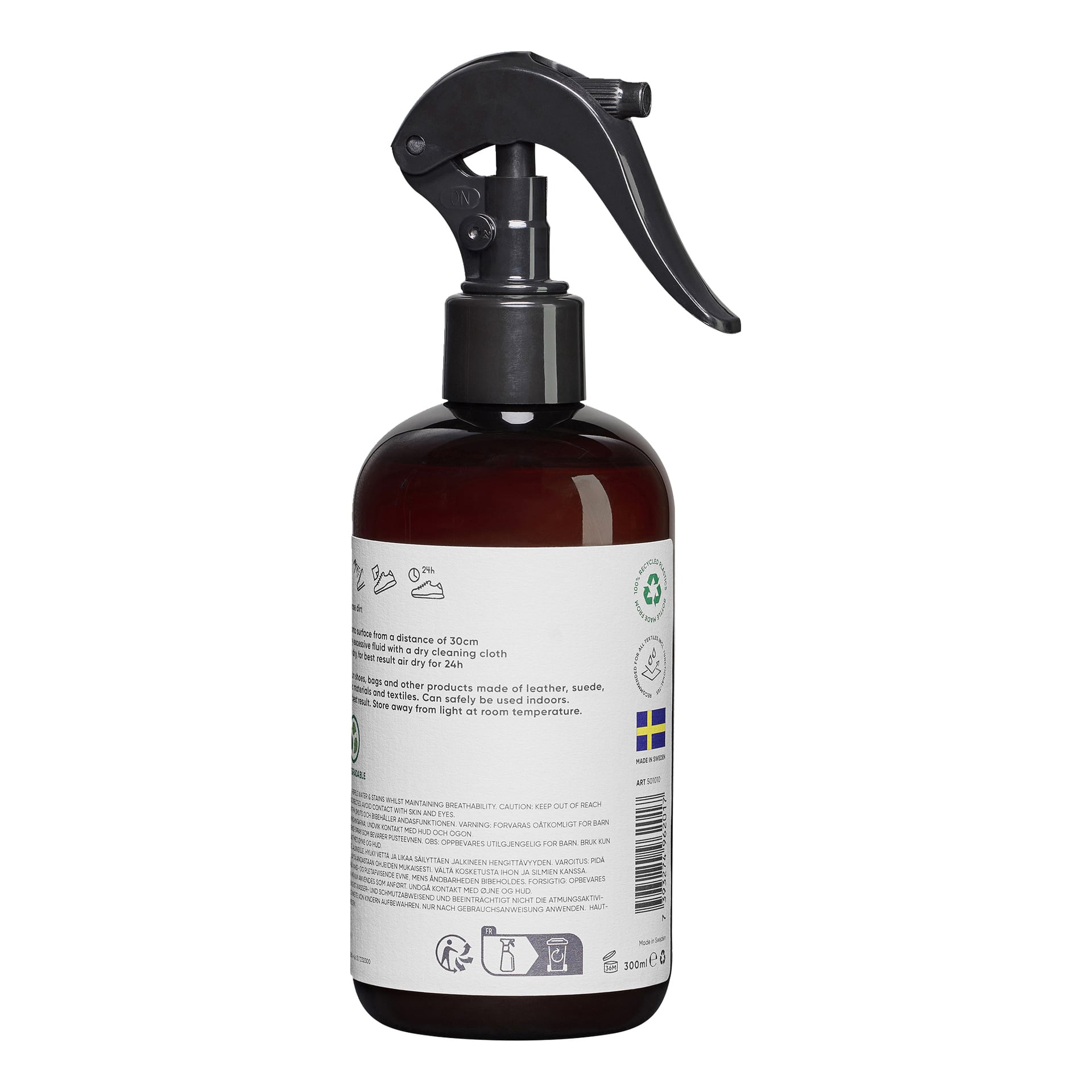 Brun sprayflaska med svart munstycke och en vit etikett med text, instruktioner, återvinningsikoner och en liten svensk flagga. 300 ml.