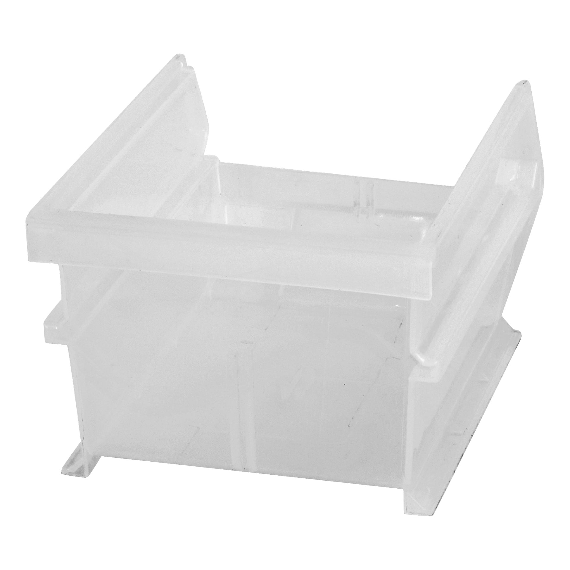 En kompakt, transparent plastdel med utvidgade sidor, öppen topp och små basfötter; Troligen ett elektronikkontaktshus.