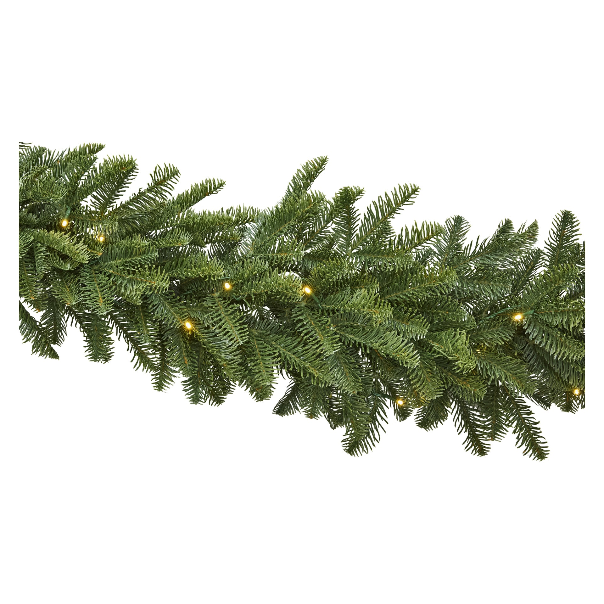 En grön tallkrans prydd med små varma vita lampor.