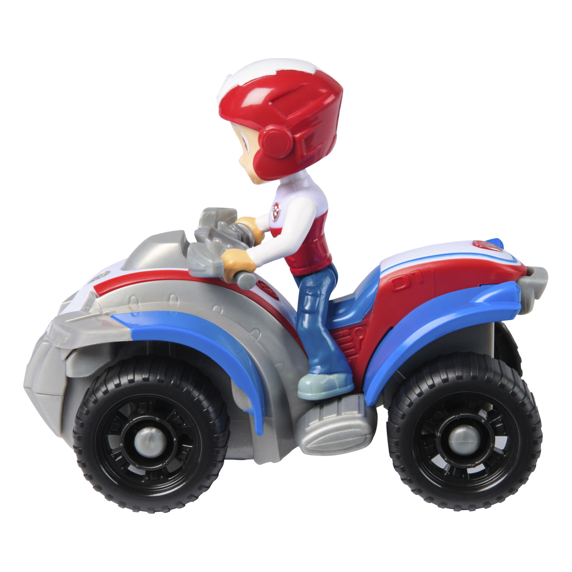 Paw Patrol Ryder -toimintahahmo, punainen kypärä ja valkoinen paita, istuu punaisen, sinisen ja harmaan Paw Patrol -mönkijän päällä. Sivukulma korostaa mustia renkaita, joissa on näkyviä kulutuspinnan kuvioita.