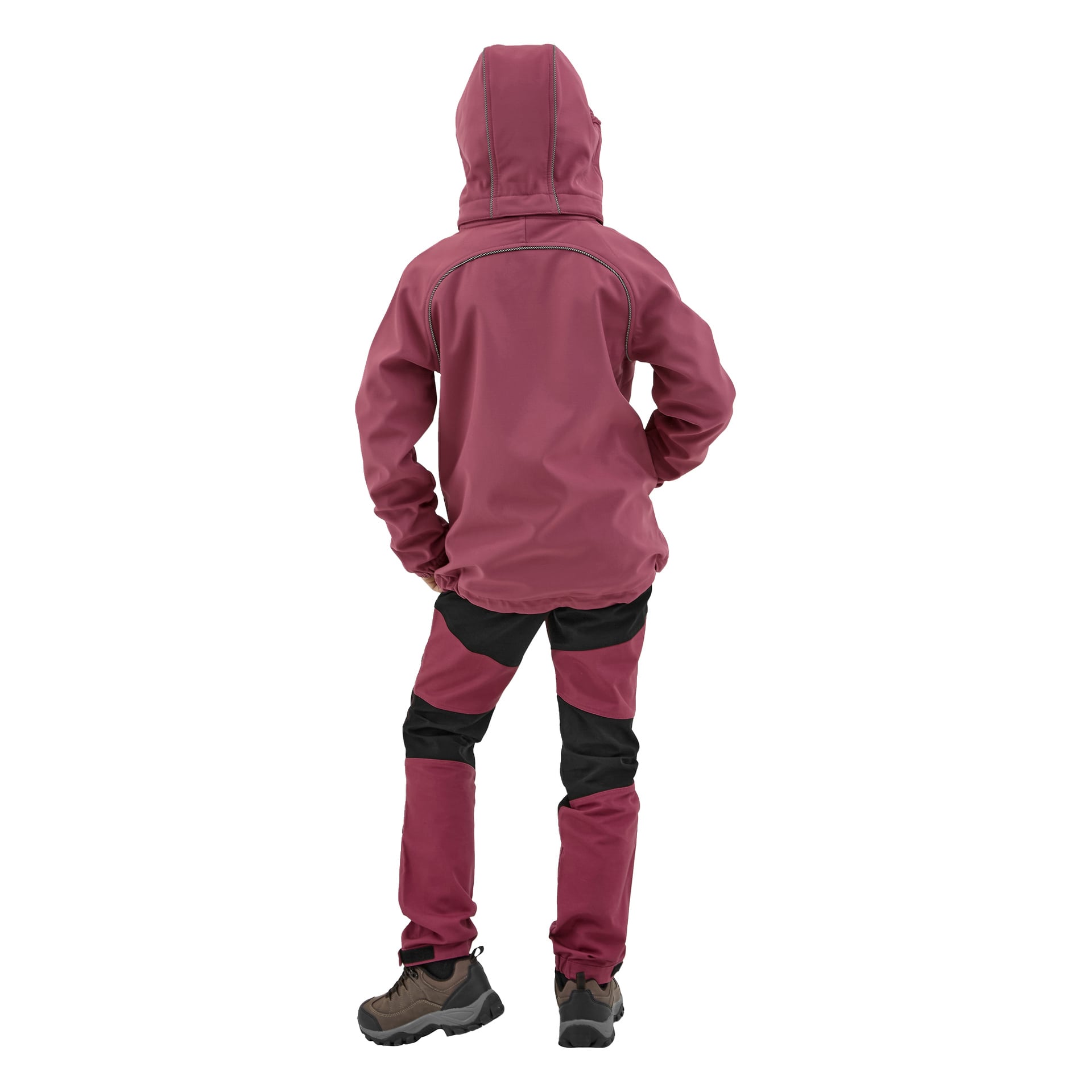 Henkilö katsoo poispäin kamerasta, pukeutuneena viininpunaiseen Kayoba Outdoor Children's Softshell Jacket Kramforsiin, yhteensopiviin viininpunaisiin ja mustiin housuihin sekä harmaisiin vaelluskengiin.