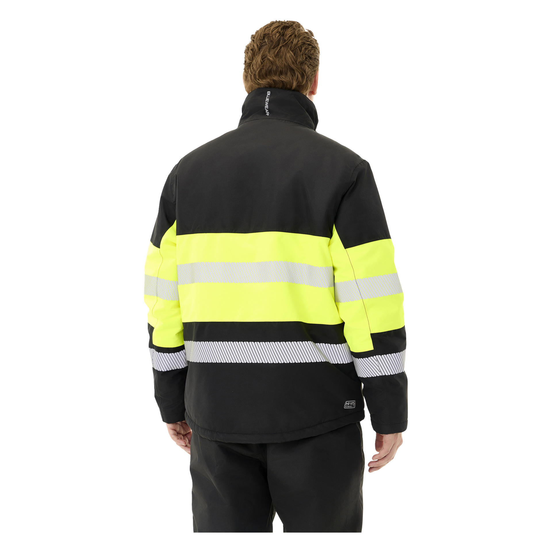 Sett bakfra bærer man Bluewear Padded hi-vis-jakken Lawson i svart, med to brede horisontale fluorescerende gule striper og reflekterende sølvbånd på både ermene og korsryggen. Personen er også kledd i matchende svarte bukser.
