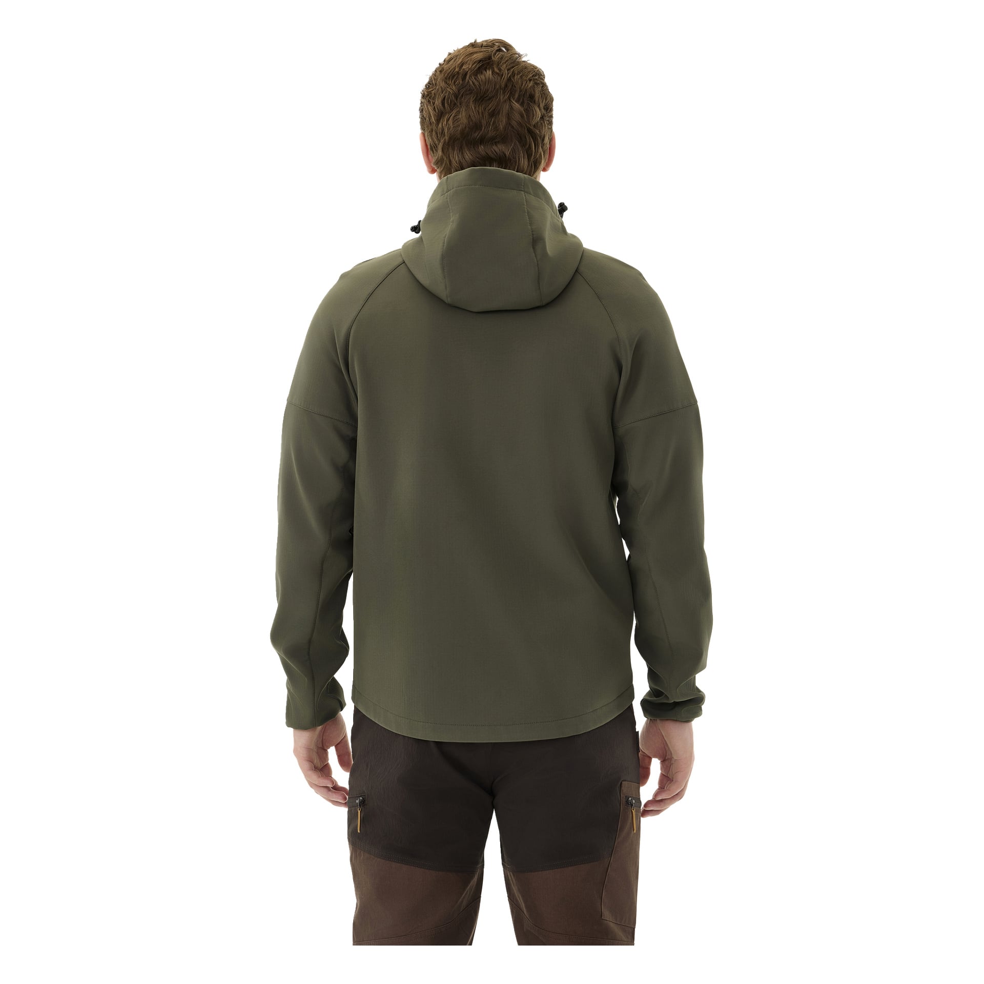 Takaa nähdään lyhyet ruskeat hiukset omaava henkilö, joka on pukeutunut Kayoba Outdoor Women's Hede -softshell-takkiin oliivinvihreässä ja tummanruskeissa housuissa, seisomassa suorassa.
