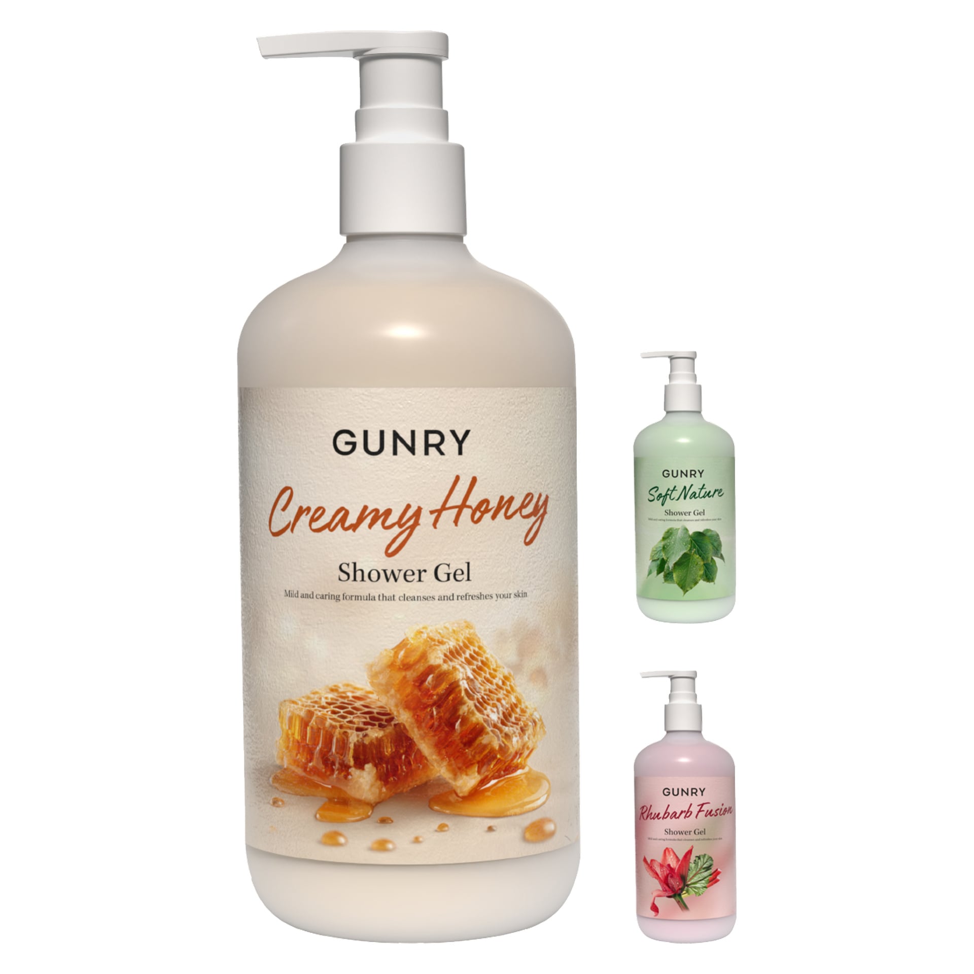 Näytetään kolme Gunry-suihkugeelipulloa. Suurin on merkitty "Gunry Shower Gel Creamy Honey" hunajakennokuviolla. Kaksi pienempää pulloa ovat "Soft Nature", jossa on mintunlehtiä, ja "Rhubarb Fusion", joka on koristeltu vaaleanpunaisella raparperilla ja kukkakuvituksella.