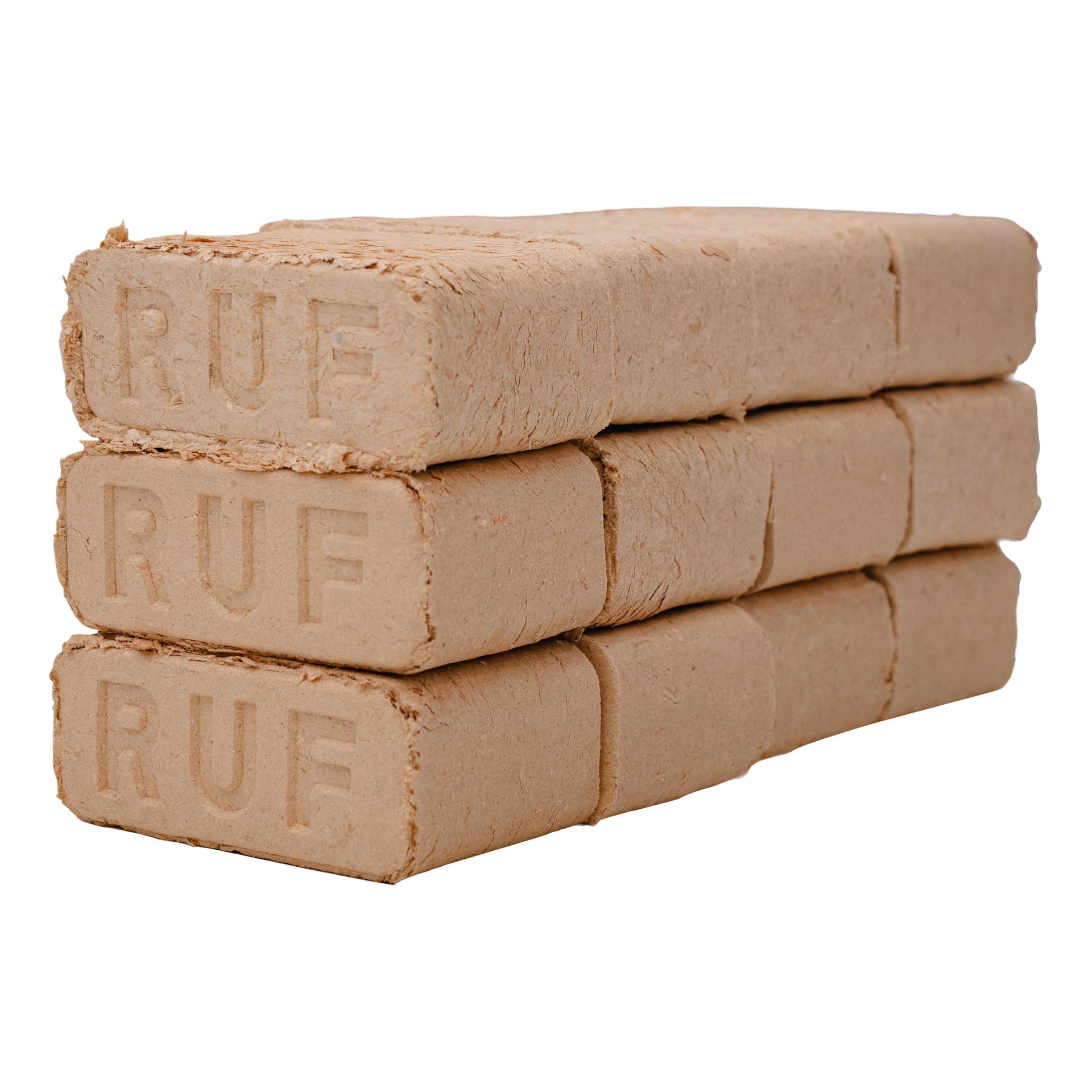 Tre staplar rektangulära, komprimerade träbriketter från No är prydligt arrangerade. Varje stapel har tre tätt packade briketter med grova kanter och en enhetlig beige färg.