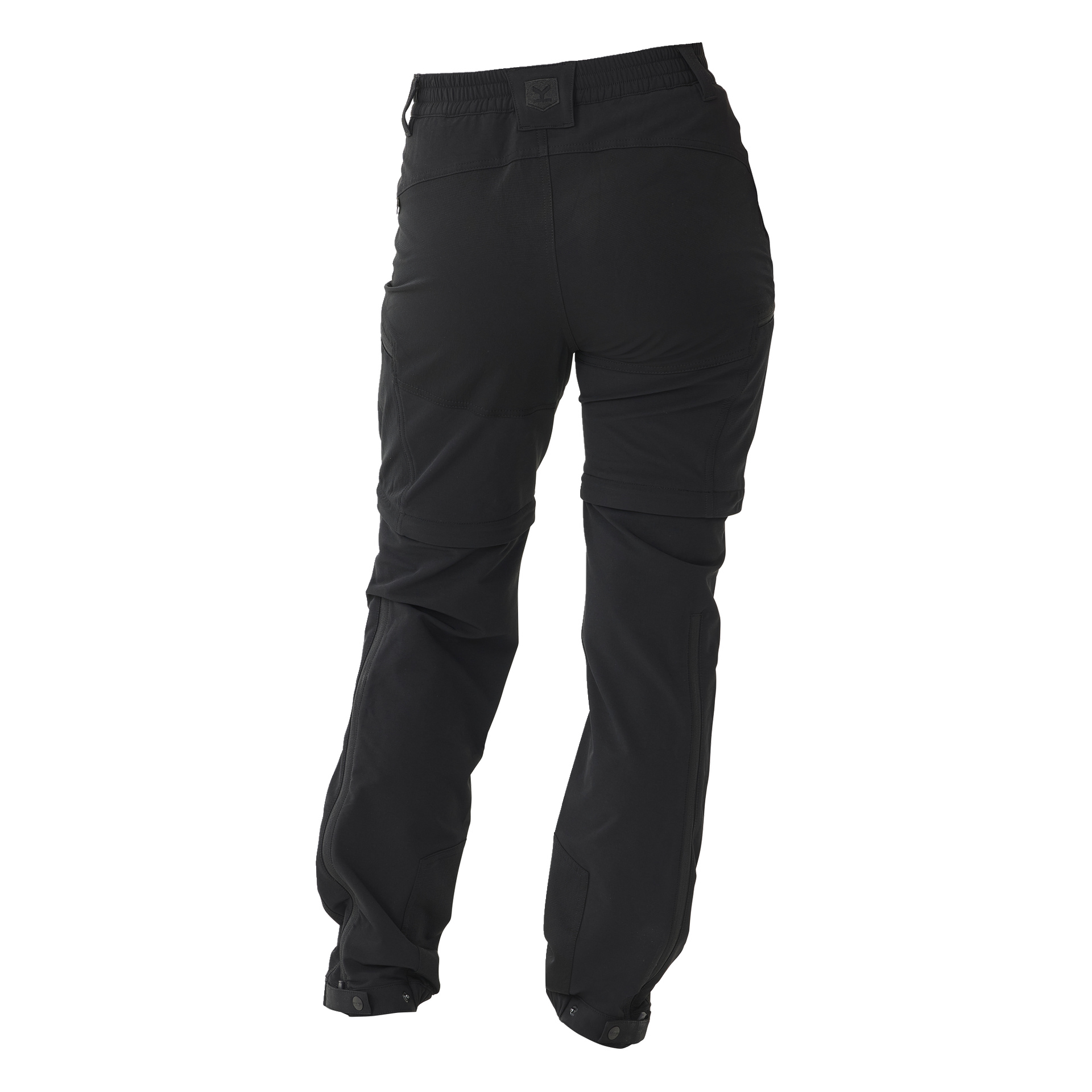 Dambyxor Abisko utomhus med dragkedja från Kayoba Outdoor" visas bakifrån med elastisk midjeband, bakfickor och avtagbara ben för att göra om till shorts. Nedersta muddarna är justerbara.