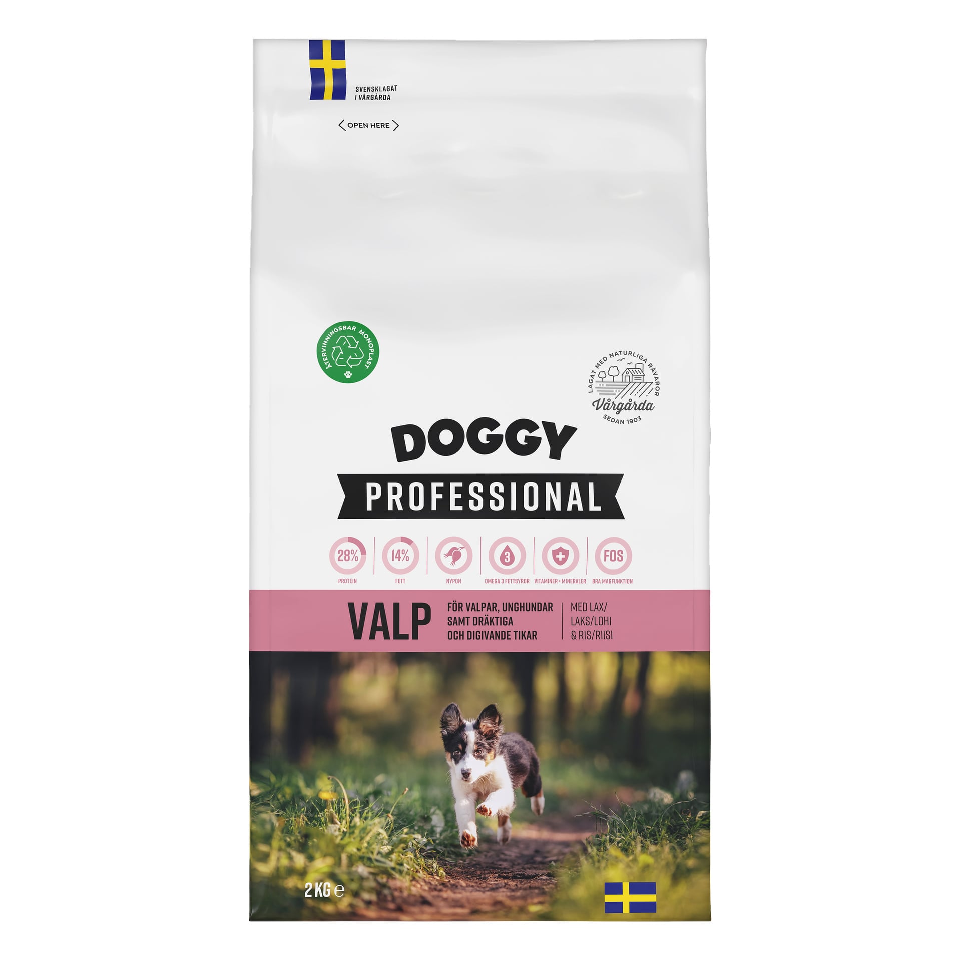 En 2 kg vit påse med Doggy Dry hundfoder Professional Valp för valpar visas med logotyper, procentantal, svenska flaggor och en springande valp på gräs. Förpackningen innehåller citat som Professional Valp och för valpar.