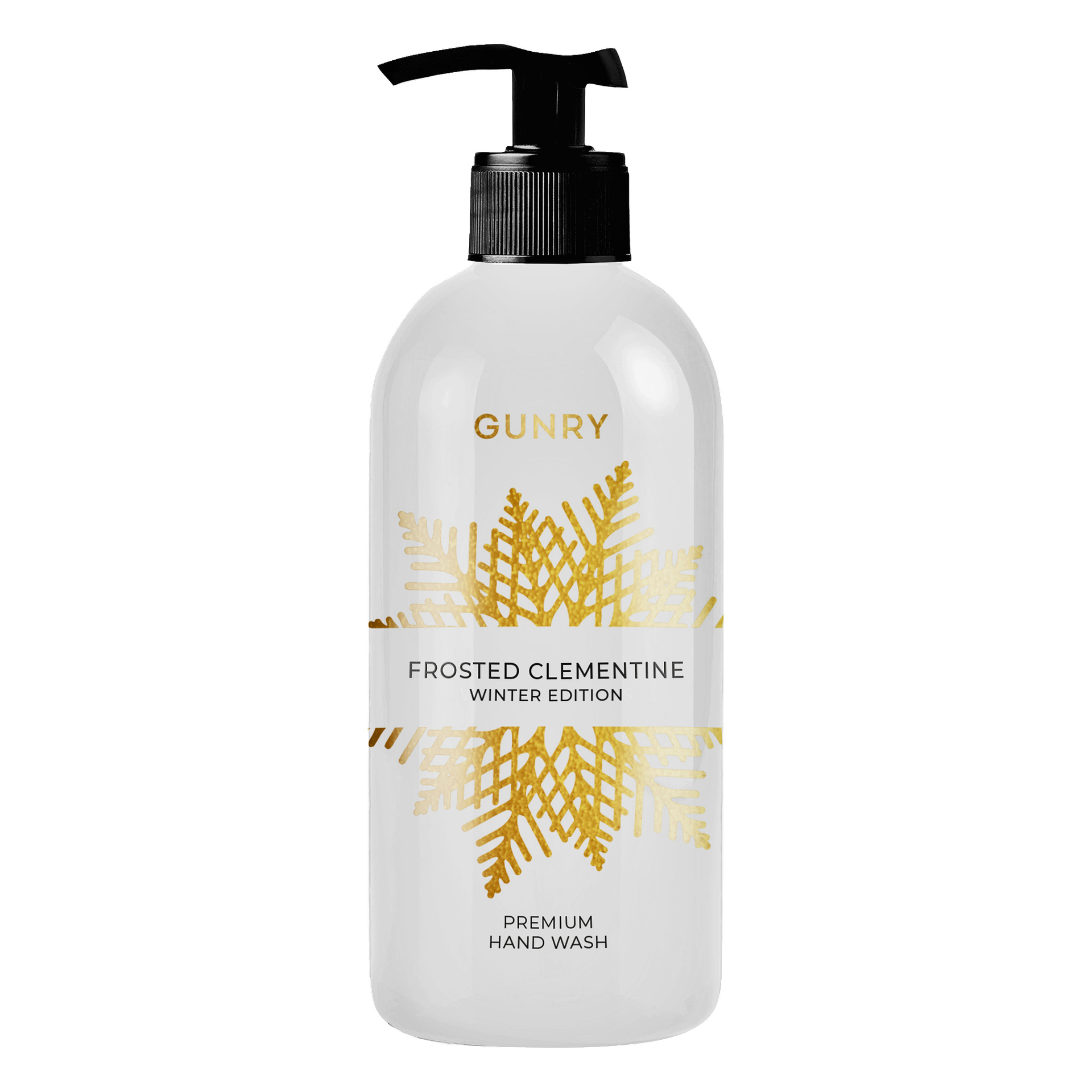 Kirkas muovipullo, jossa on musta pumppu, jossa on kultainen lumihiutale-etiketti, jossa lukee Gunry Hand Soap Winter Edition ja joka on täytetty valkoisella nesteellä.