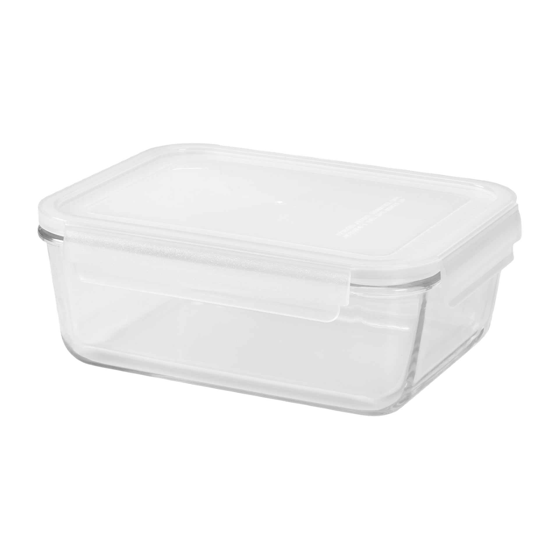 En Menuett Food-låda visas upp, bestående av en klar rektangulär glasbehållare med genomskinligt plastlock och sidospänn för säker stängning. Lådan är tom.