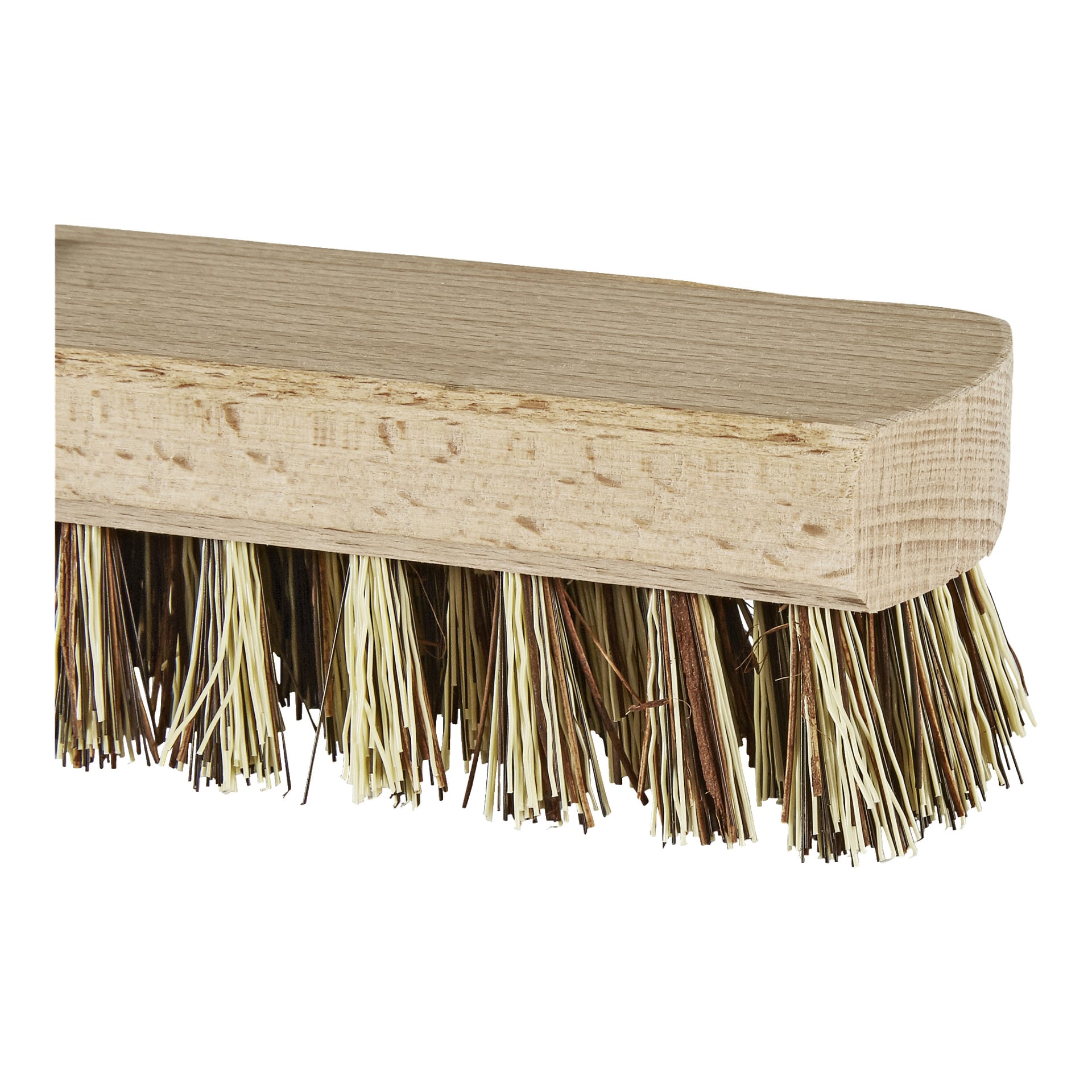 En närbild av Menuett Scrubbing-borsten som visar ett rektangulärt trähandtag och en tät klunga av styva bruna och beige borst. Endast en del av handtaget och borstdelen är synlig.