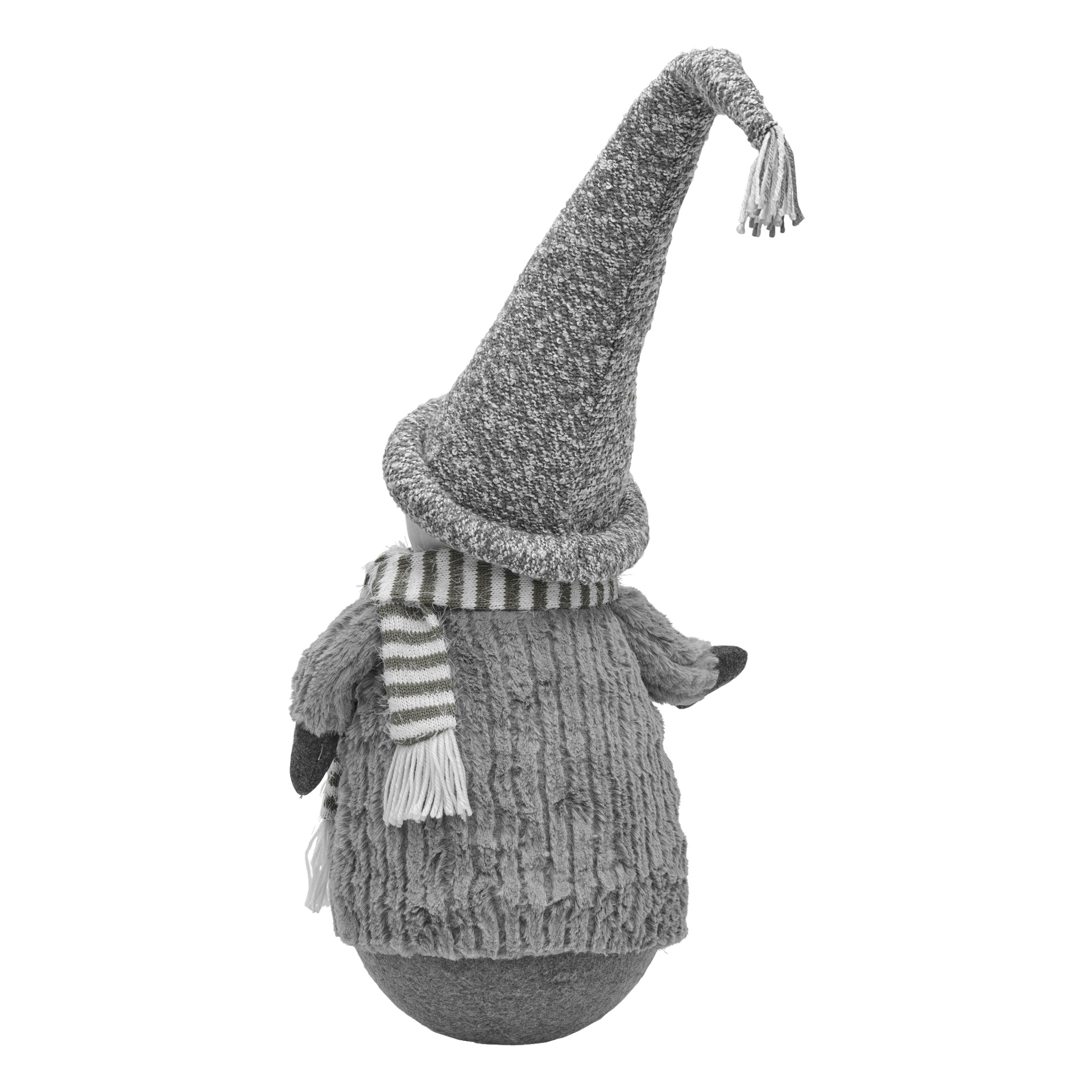 En myk EKVIP snømann med høy, spiss lue, skjerf og teksturert antrekk sees bakfra. Bildet er i svart-hvitt.