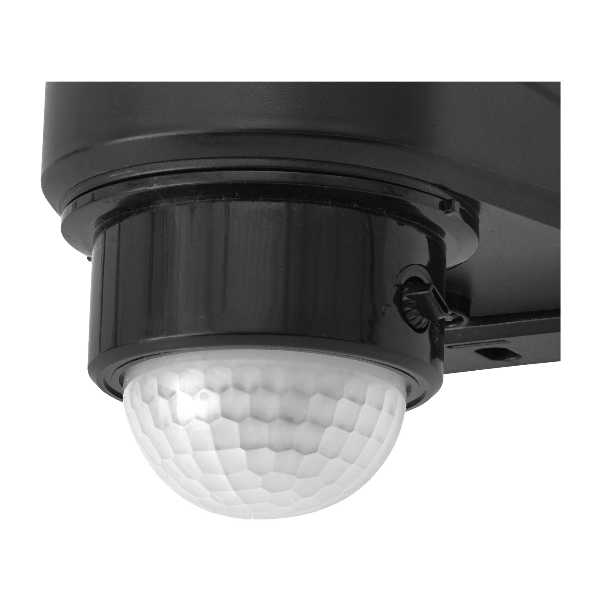 Detaljerad vy av en Anslut-strålkastare utrustad med en rörelsedetektor-LED, som visar en vit texturerad kupolsensor i svart plast monterad på ett fäste.