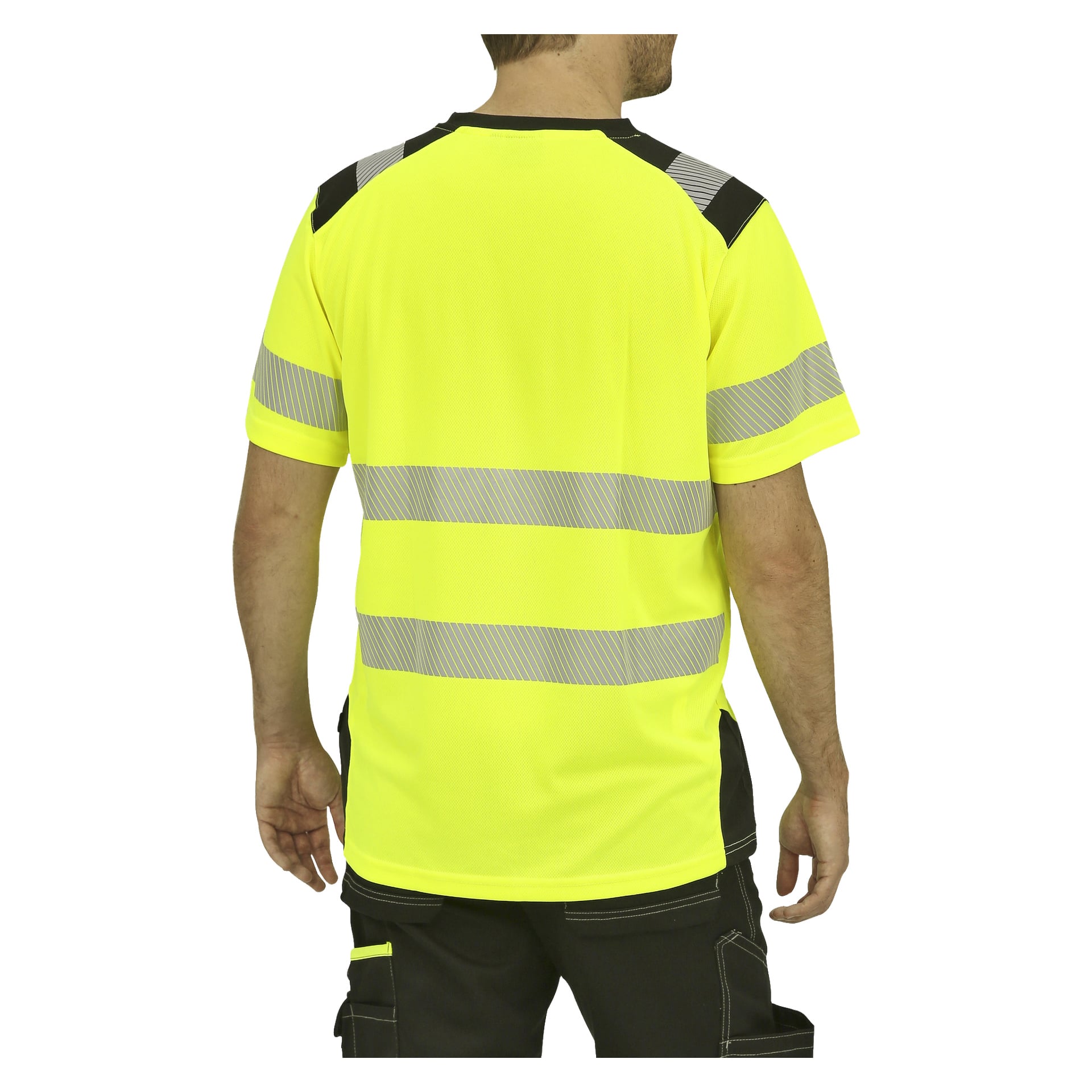 En person ses bakifrån, klädd i en gul Bluewear kortärmad hi-vis tröja med reflekterande grå ränder och svarta detaljer. De bär också svarta byxor med tydliga sömmar och en gul verktygsficka.