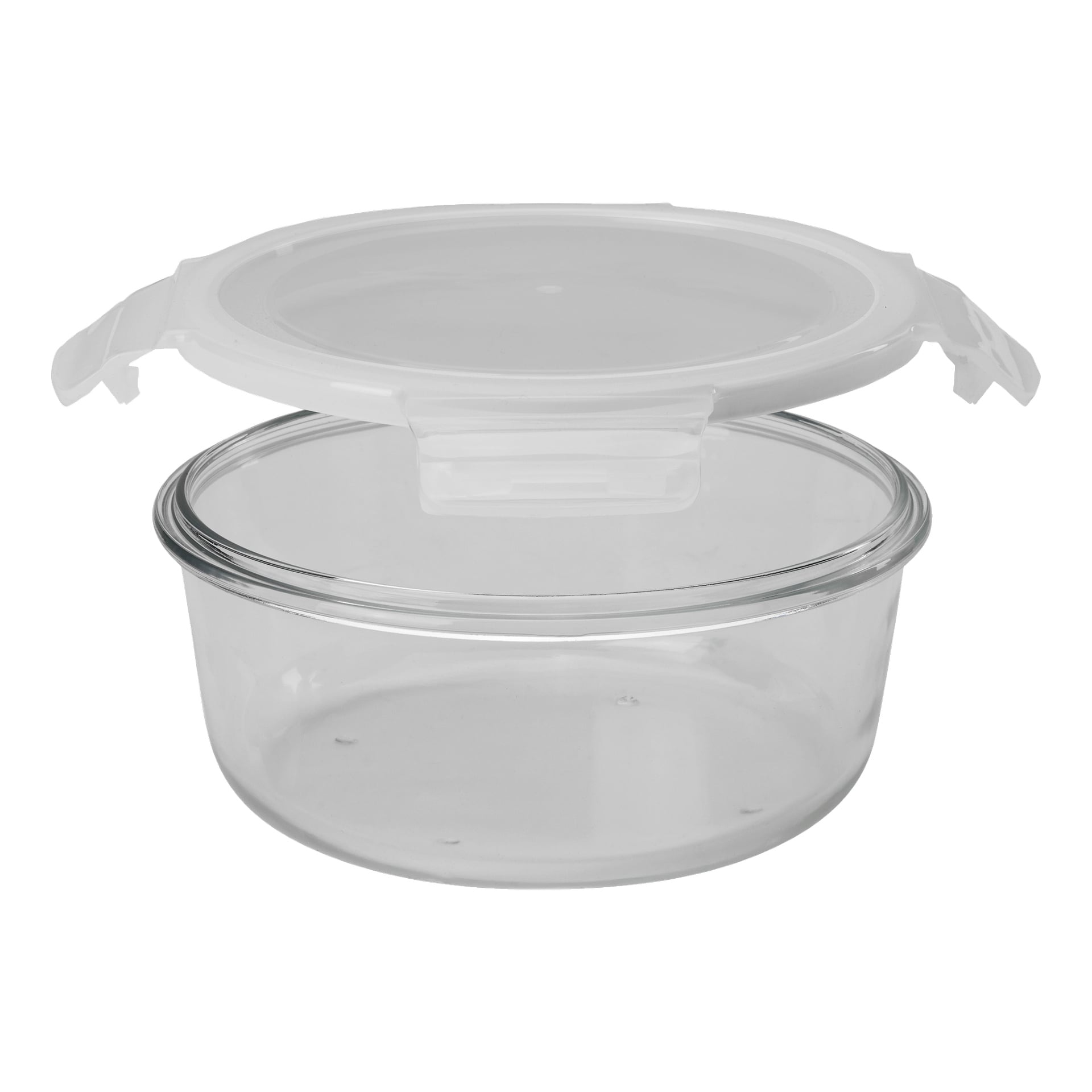 Eine Menuett Food Box mit einem runden Glasbehälter und einem durchsichtigen Kunststoffdeckel, der an jeder Seite mit Verschlusslaschen befestigt ist, ist offen und leer dargestellt.