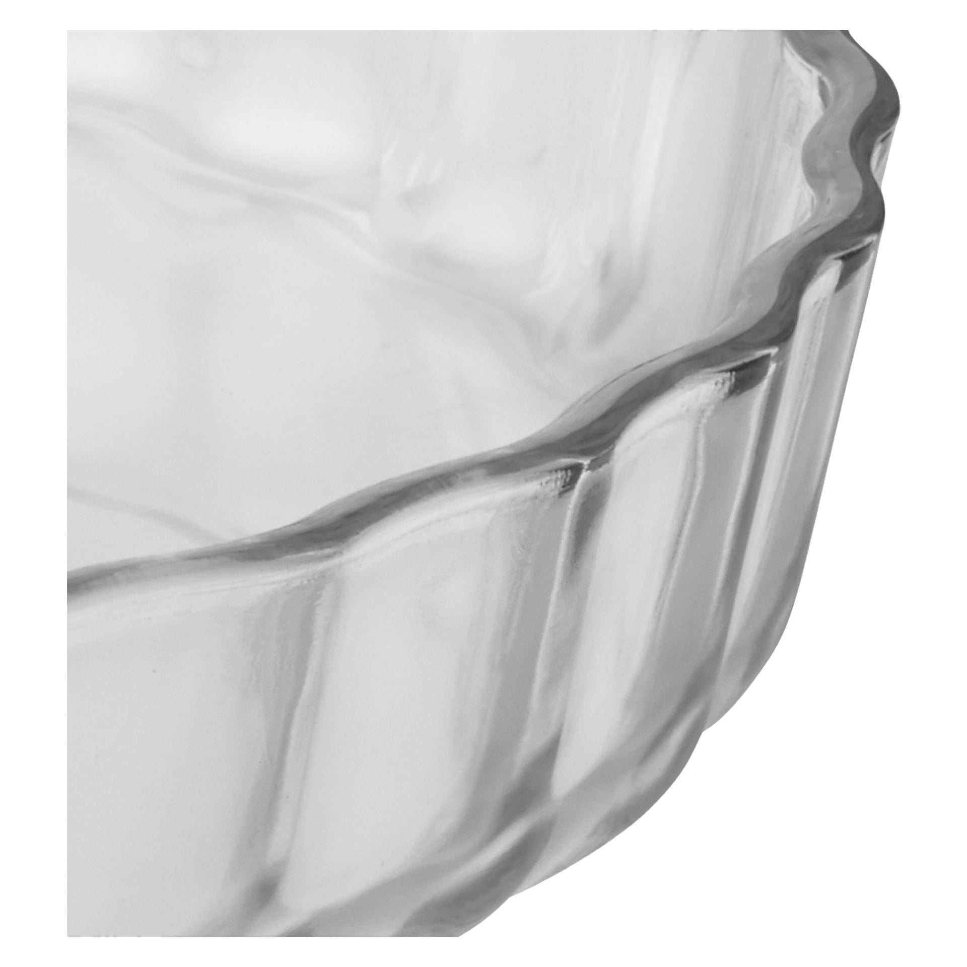 Detaljert nærbilde av Menuett Pie Dish, som viser dens gjennomsiktige glasskonstruksjon med bølgete, rillede kanter og et teksturert mønster langs sidene. Bildet fokuserer på kanten og deler av den indre overflaten, satt mot en enkel bakgrunn.