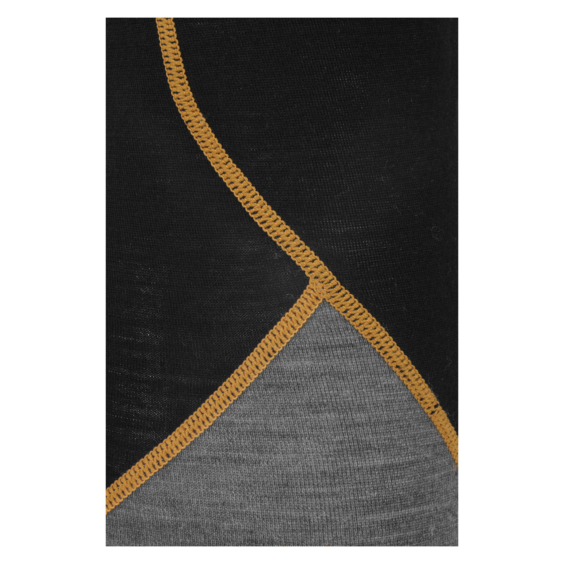 Detaljerad vy av Bluewear Pro Workwears baslagersbyxor, med svarta och grå tygpaneler förbundna med en distinkt zigzag-orange stygn som framhäver texturen och hantverket.