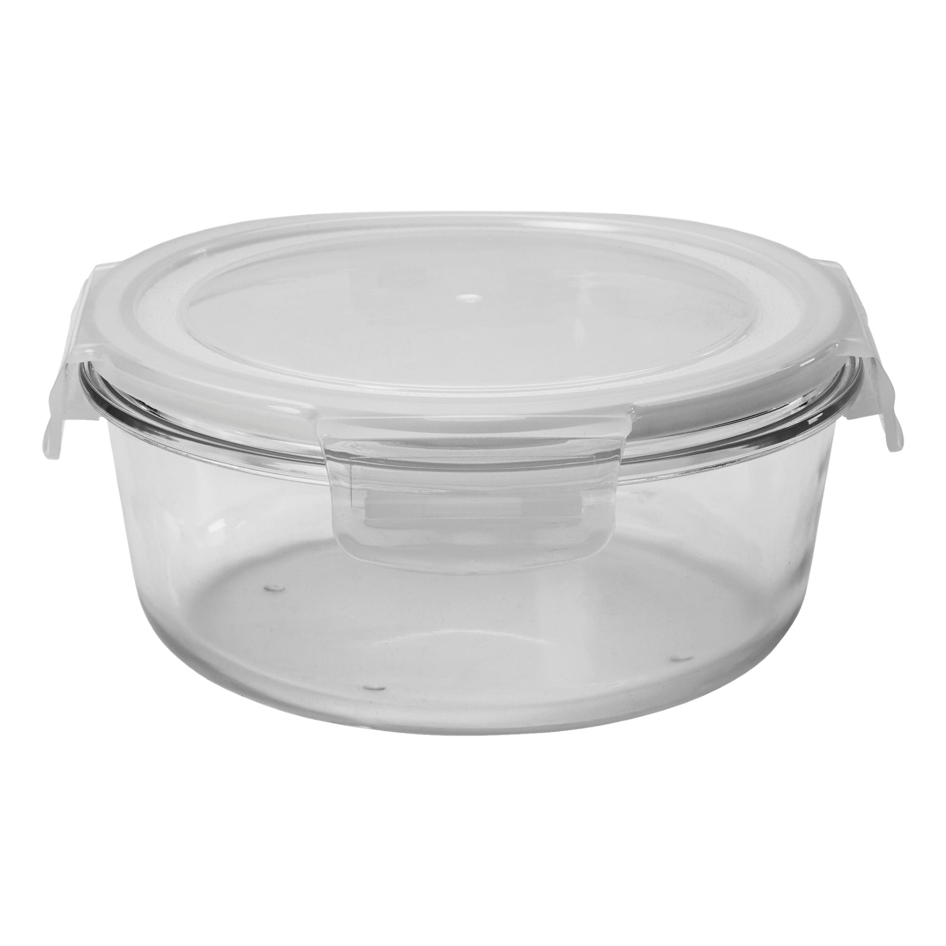 Menuett Food-lådan är en tom, klar rund glasbehållare med ett genomskinligt plastlock som är fastsatt med sidolås.