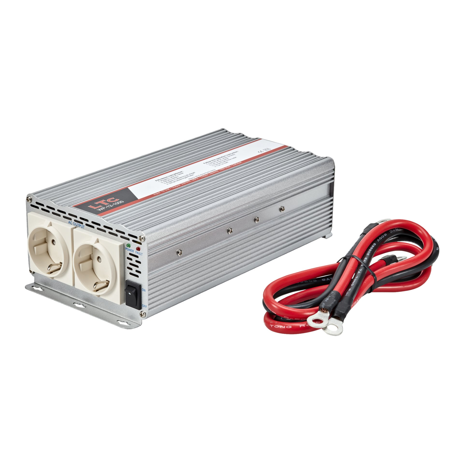 LTC Voltage Converter 12-1000 har ett silverfärgat, räfflat metallhölje med en etikett på toppen. Den har två uttag i europeisk stil och en svart strömbrytare, placerad bredvid röda och svarta strömkablar som slutar i ringterminaler.