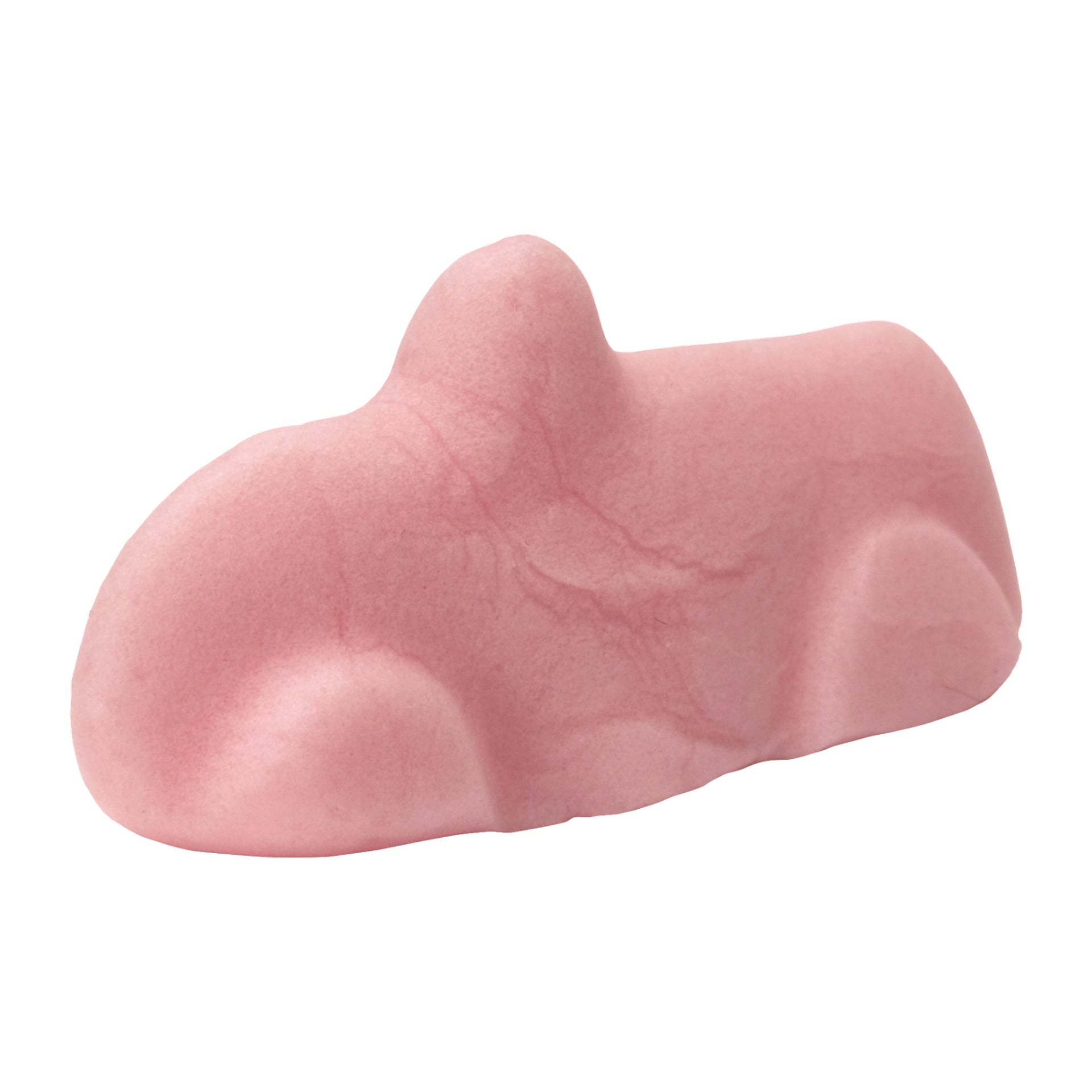 En rosa, slät Cloetta Ahlgrens Bilar Original-godis formad som en bil med rundade kanter och en liten upphöjd sektion på taket.