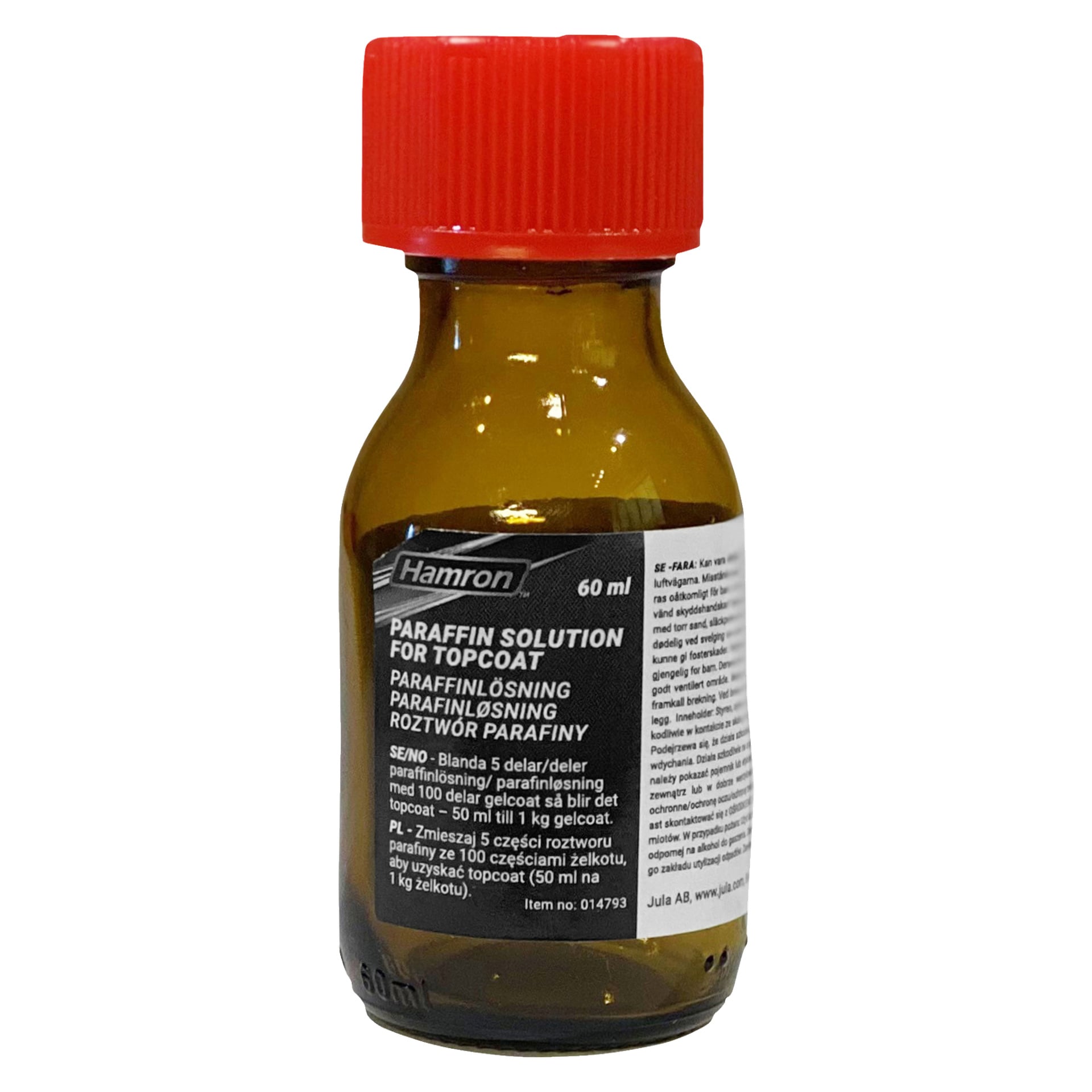En liten bärnstensfärgad glasflaska med röd kork, märkt "Hamron Paraffin Solution" (60 ml). Etiketten visar bruksanvisningar.
