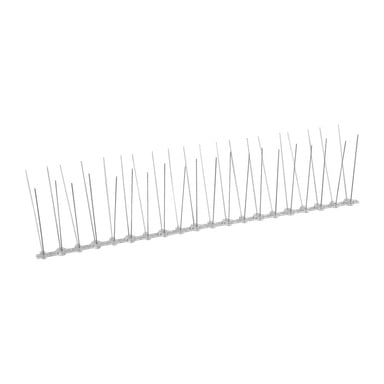 Flera metallspikar är arrangerade i en rad och sticker uppåt och utåt från en transparent plastbas. Märkta som "Hard Head Bird Spikes 6 bitar" är de avsedda att förhindra att fåglar landar på hyllor, staket eller andra ytor.