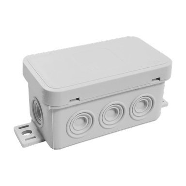 Skrzynka Duwi Switchbox to prostokątna puszka rozłączająca elektryczna wykonana z szarego plastiku, z zabezpieczoną pokrywą i kilkoma okrągłymi otworami wysuwanymi po bokach do porządkowania kabli i łączenia elektrycznych.