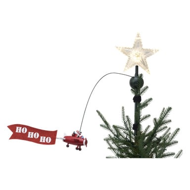 EKVIP Top Star med Flying Santa-trädtoppen visar en lysande stjärna högst upp, med en miniatyrtomte som färdas på ett rött flygplan på en böjd stång precis nedanför. Tomten drar en glittrande "HO HO HO"-banderoll bakom sig, och den övre delen av julgranen syns längst ner på bilden.