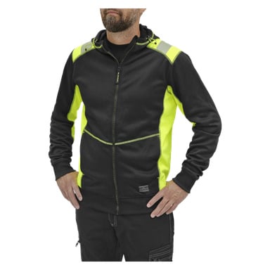 En man står med händerna i sidorna, klädd i Bluewear Men's Felix-hoodie. Den svarta zip-up-hoodien har neongula paneler, en neongul huva och tydliga sömdetaljer. Han bär den med svarta byxor, och en del av hans ansikte syns inte i bilden.