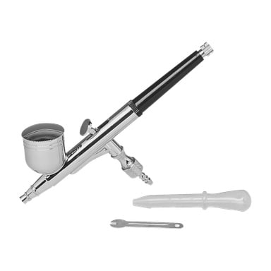 Meec Toolsin airbrush-suihke on esillä pienen muovisen tiputuslaitteen ja metallityökalun rinnalla.