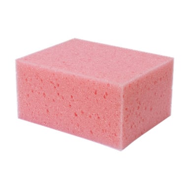 En rektangulär rosa Comensal-kakelsvamp med en porös yta.