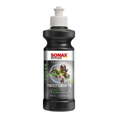 En 250 ml svart plastflaske med Sonax Polish Profiline Perfect Finish bilpoleringsmiddel med hvit kork. Etiketten viser ulike grafikker og produktdetaljer, fremhevet med grønne, sølv- og røde detaljer.
