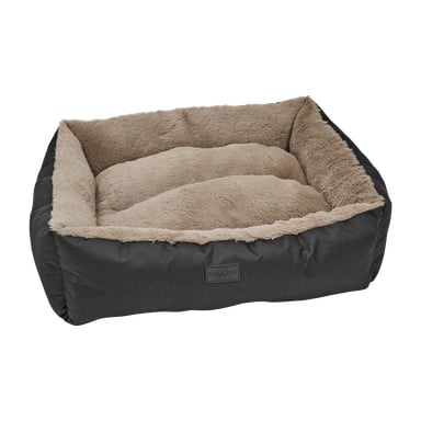 Kayoba Dog Bed är rektangulär med höga, mjuka, luddiga sidor och en vadderad bas. Dess yttre är svart tyg, medan insidan är fodrad med ljusbeige fuskpäls. Framsidan visar en liten Kayoba-etikett.
