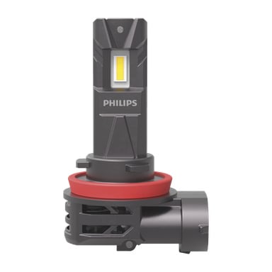 Żarówka reflektora Philipsa LED FOG Ultinon Access 2500 stoi pionowo, wyświetlając prostokątny panel LED, czerwoną okrągłą uszczelkę oraz czarne plastikowe złącze u podstawy. Na przedniej stronie żarówki widnieje logo Philipsa.