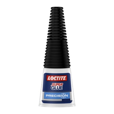 En Loctite Superglue Precision-flaska med en svart kapsyl med texturerad svart lock och en blåvit etikett som visar varumärket och produktnamnet.