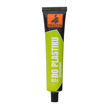 Tubka kleju Dragon Plastic z zielono-białym wzorem, czarną nakrętką i pomarańczowym logo smoka. Na opakowaniu widnieje etykieta "Klej do plastiku" oraz słowo "bezbarwny", co oznacza, że klej jest bezbarwny.