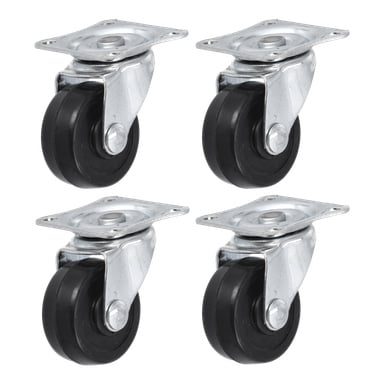 Fyra identiska svarta Hard Head svängbara hjul med silverfärgade monteringsplattor, säljs som 4-pack, är arrangerade i ett rutmönster.