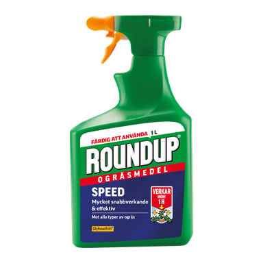 En 1-liters grön sprayflaska Weed Killer med gul-orange munstycke. Etiketten säger att den verkar snabbt mot alla typer av ogräs och lovar synliga resultat inom en timme.