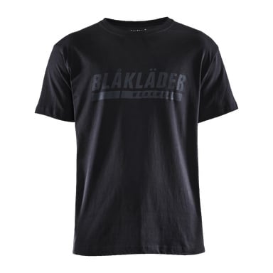 En enkel svart herr-T-shirt från Blaklader, med "BLÅKLÄDER" över bröstet i stora feta bokstäver och "WORKWEAR" under i mindre stil.