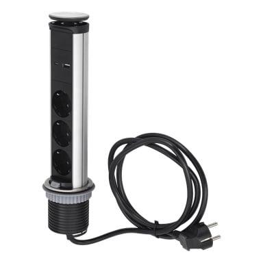 Anslut Power Strip Pop-up er en sølv- og svart enhet laget for å installeres i pulter eller benkeplater. Den inneholder tre sirkulære strømkontakter, to USB-porter og en svart ledning som ender med en europeisk plugg.