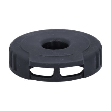 En rund, svart plastcylinderlock med spikpistol med ett centralt hål och sidospår, uppställd i vinkel.