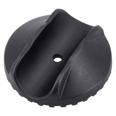 Ett runt svart vikbart fäste av räfflad plast, med ett centralt hål och två parallella upphöjda böjda sektioner på ytan.