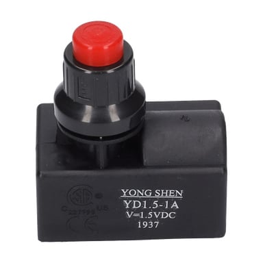 Svart rektangulär LPG-tändmodul med en röd tryckknapp på toppen; sidoetikett: YONG SHEN YD1.5-1A V=1.5VDC 1937, certifieringsmärken.