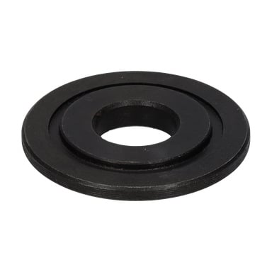 Klingwasher-bordsågen har en platt, rund svart metallbricka med ett stort mitthål och en upphöjd inre ring.